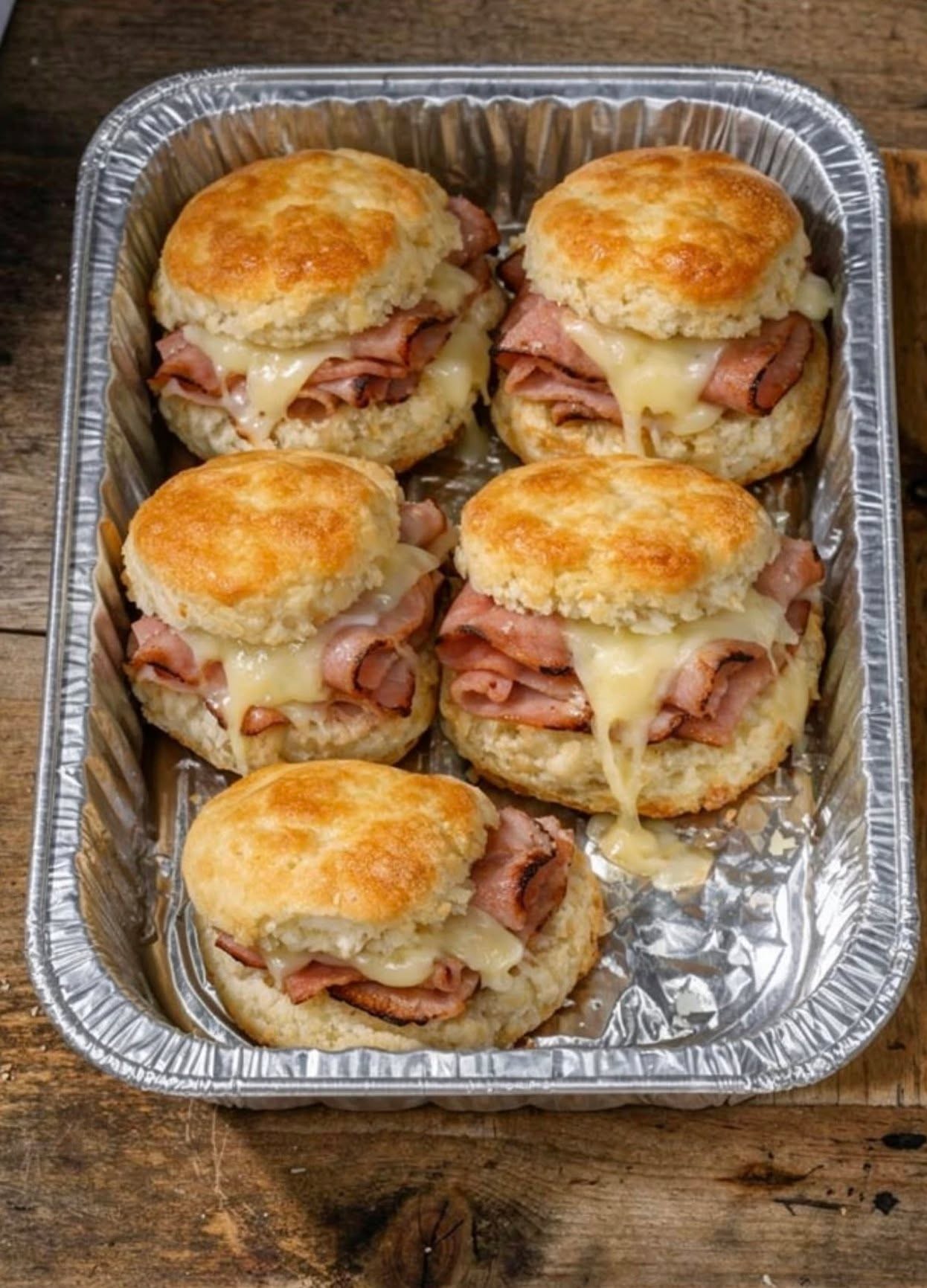 ham and cheese biscuit sliders with melted cheese